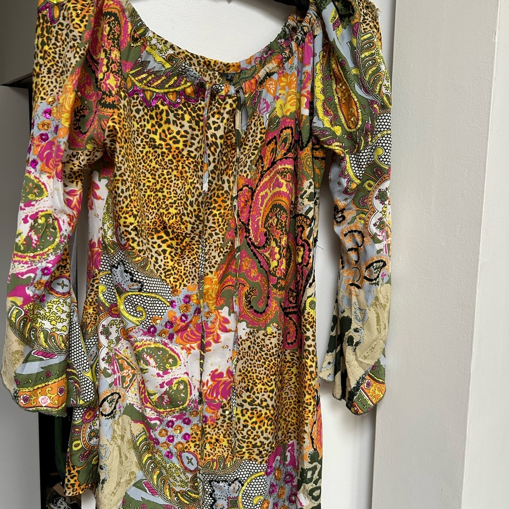 Multicoloured ladies top. Feels like silk looks like silk draw string sexy neck